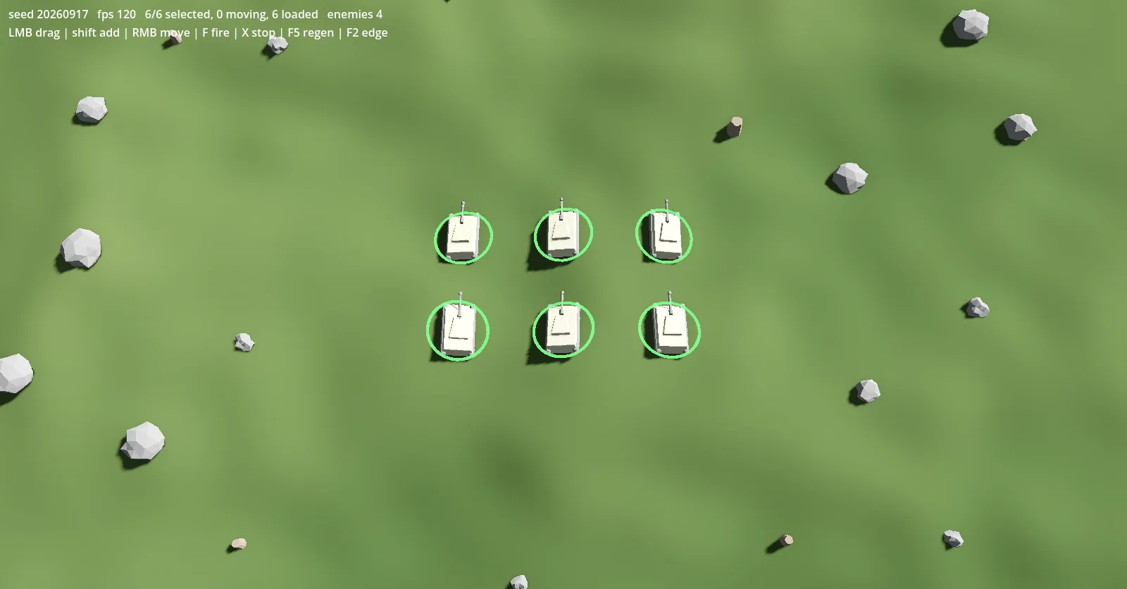 Overhead view of the six tanks holding a two-by-three formation on open grass, each ringed in green to show it is selected, with boulders scattered around them.